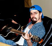 Daniel Bratcher playing guitar