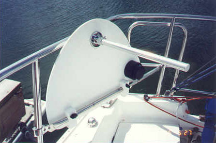 Stern seat folds up to access locker